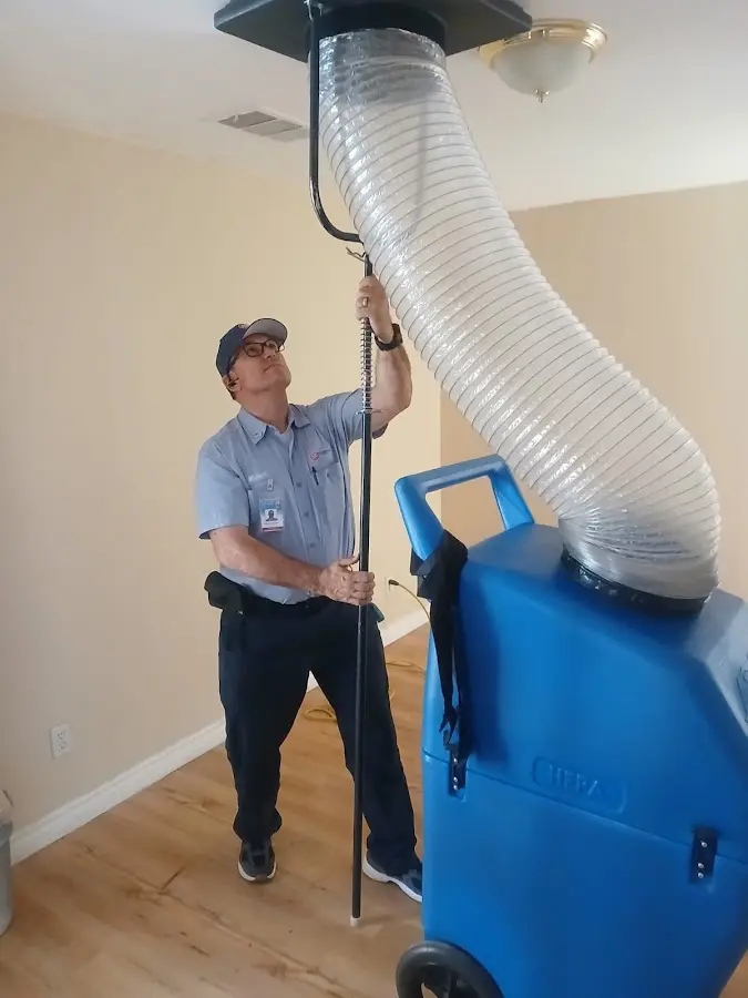 Furnace Tune-Up technician using HEPA equipment in Pittsburgh